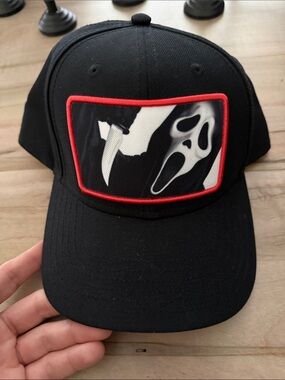 Black Trucker Hat with Red-Trimmed Ghostface Patch